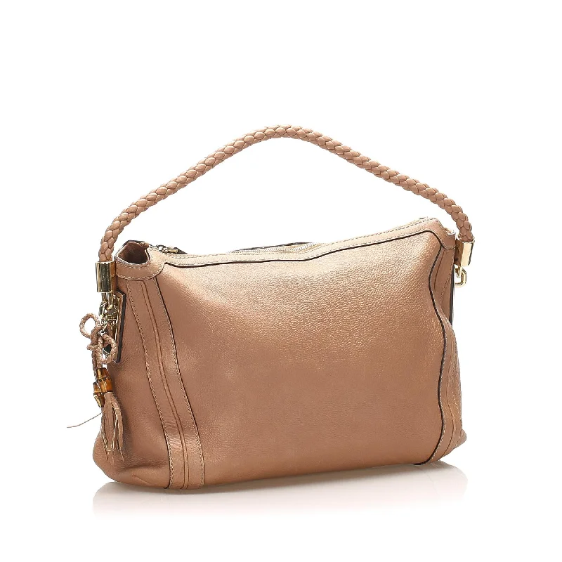 Rustic Bags For Outdoor And Nature-Inspired Looks Gucci Bella Leather Tote Bag (SHG-P61oXZ)