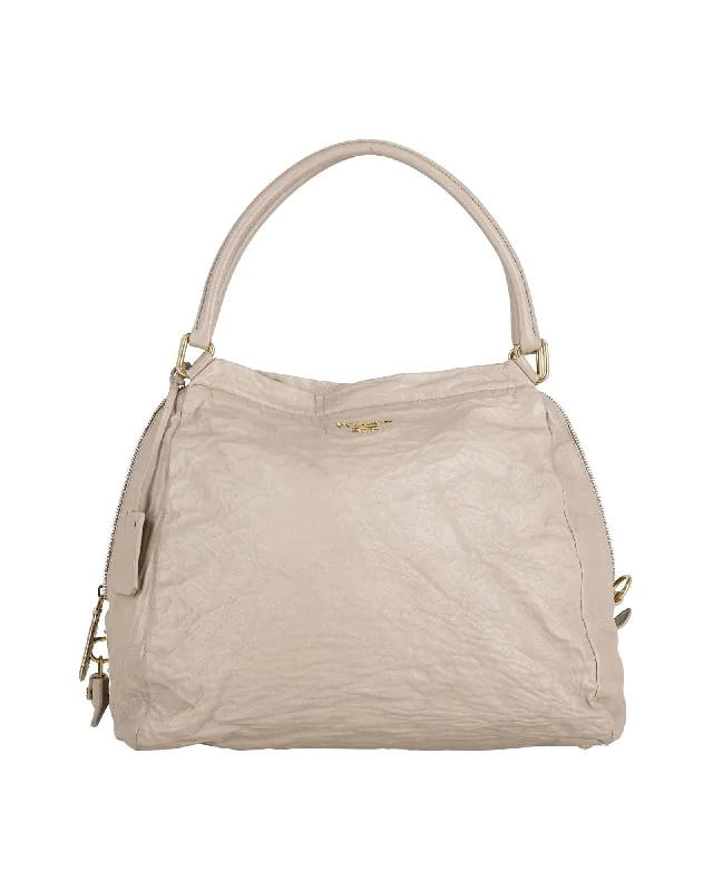 Luxury Bags With Premium Materials And Craftsmanship Prada Vitello Daino Tote Bag in Nude Calf Leather