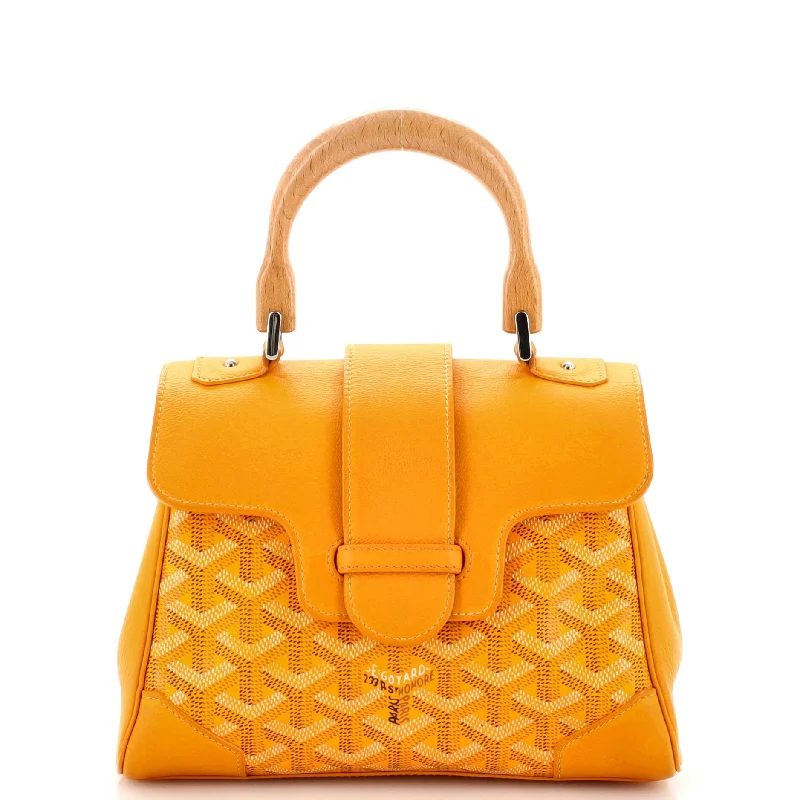 Edgy Bags For Bold And Daring Fashionistas Saigon Top Handle Bag Coated Canvas with Leather Mini